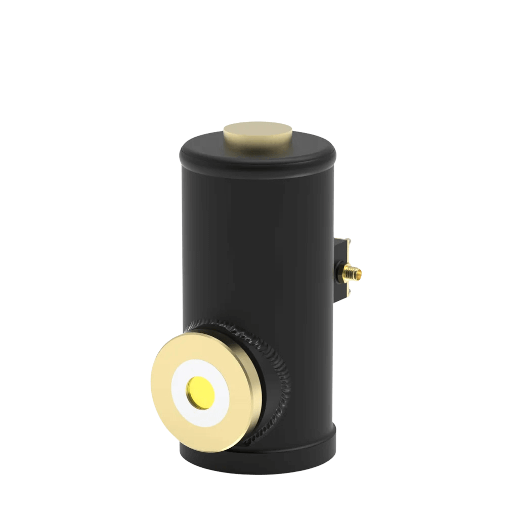 A black cylindrical device with gold accents, featuring a large circular knob on the front and a small gold connector on the side.