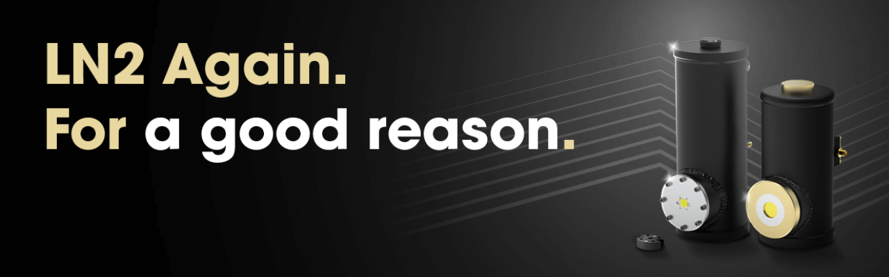 Two black cylindrical devices with gold and white accents are displayed on a dark background. The text reads, LN2 Again. For a good reason. Thin lines radiate outward behind the devices.