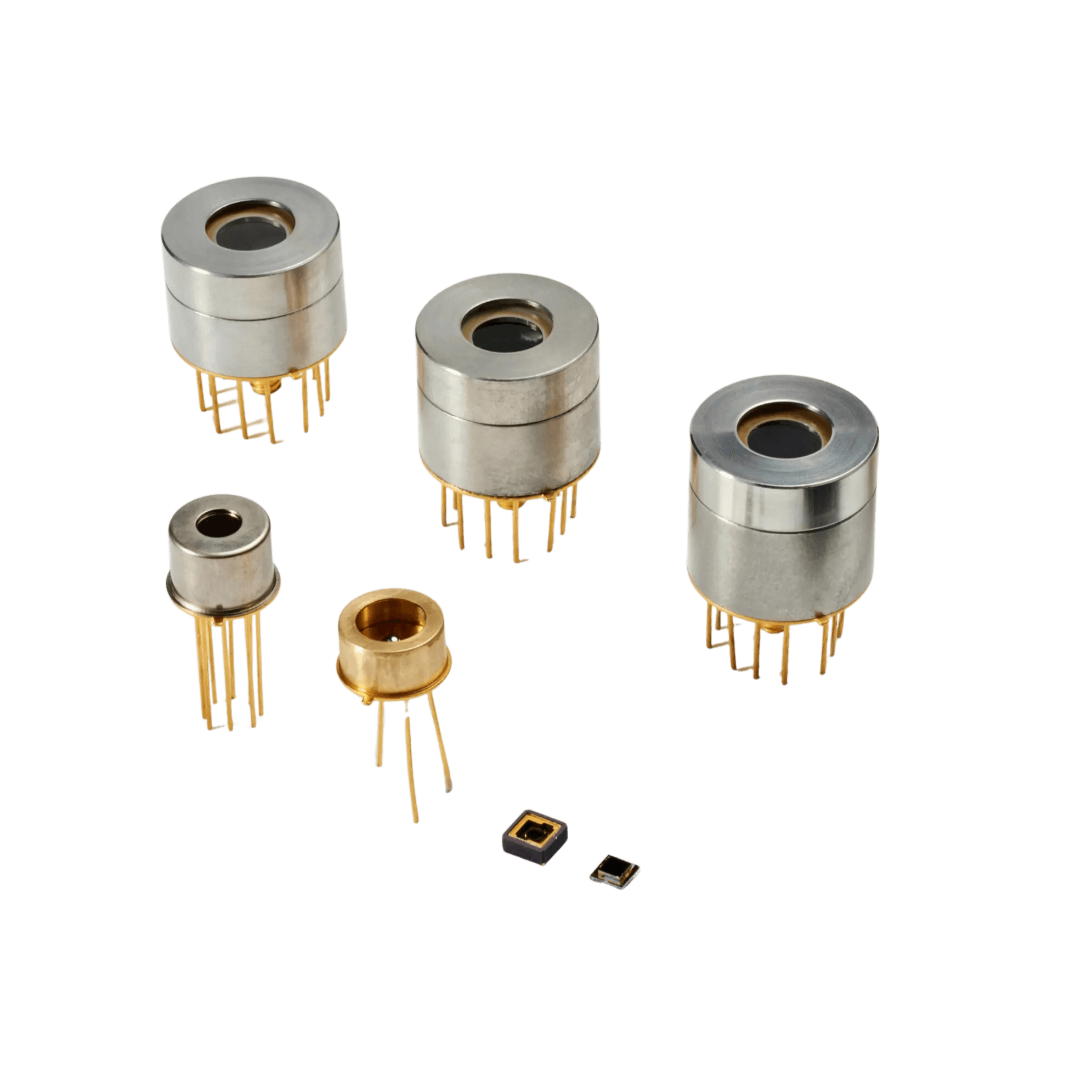 Five metal electronic components with gold pins are arranged in two rows on a white background, along with two small, flat microchips placed at the front.