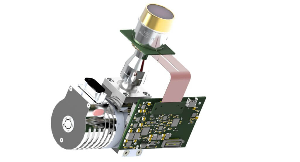 A 3D-rendered electronic device with a circuit board, ribbon cable, cylindrical metallic component, and various electronic parts interconnected in a compact assembly.