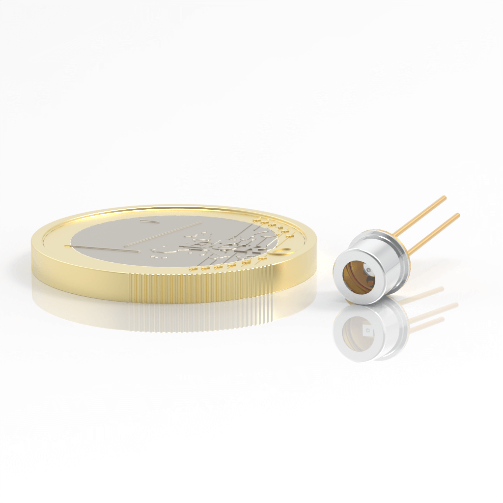 A small electronic component with two gold pins next to a one euro coin, shown on a white background for size comparison.