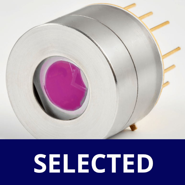 A close-up of an electronic sensor with a purple center and gold pins, shown above a blue banner with the word SELECTED in bold white letters.