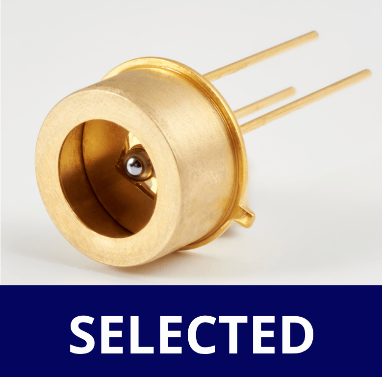 A gold-colored electronic component with three pins and a central sensor, resting on a white surface above a blue banner with the word SELECTED in bold white letters.