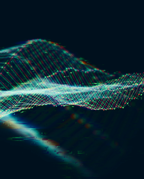 A digital abstract image shows colorful, wavy grids of light forming a 3D mesh pattern on a dark background, resembling data visualization or sound waves.