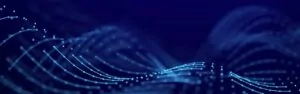A dark blue abstract image with dynamic, flowing wave patterns composed of interconnected dots and lines, resembling a digital or technological representation of data movement or communication.