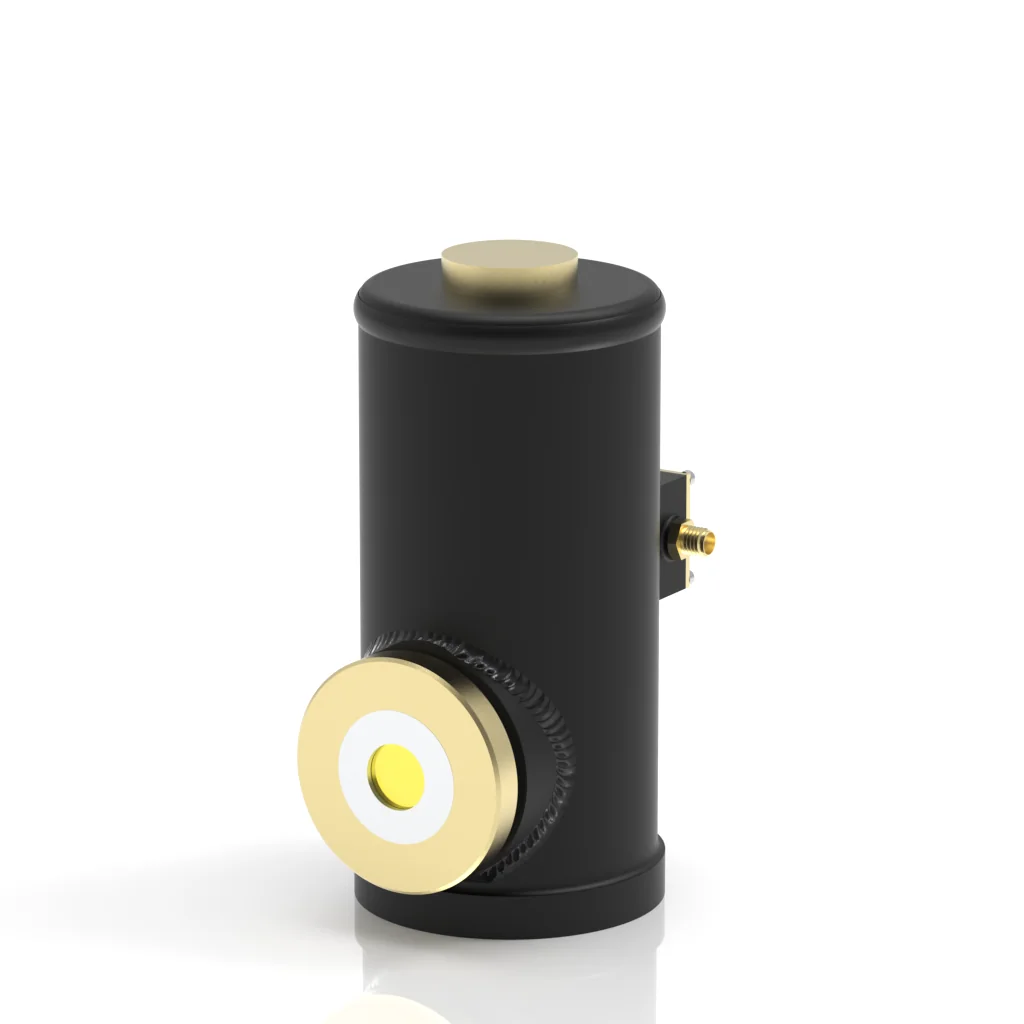 A cylindrical black metal device with gold-colored circular components on the top and front, and a small gold connector on the side, displayed against a white background.